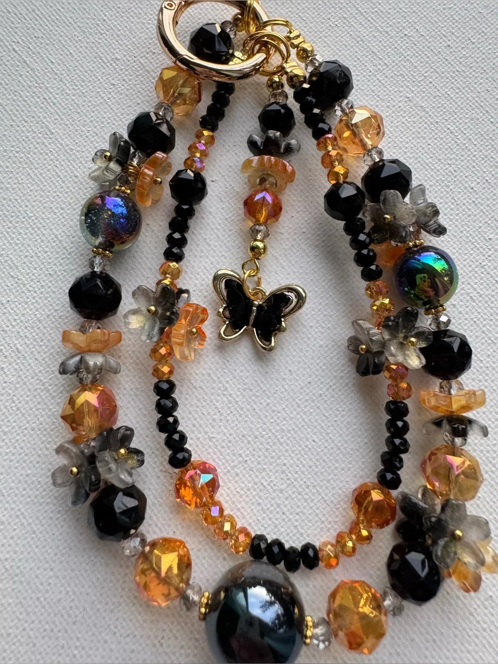 Handmade Black and Orange Beaded with Butterfly Charm